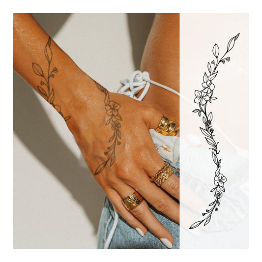 Weekink Floral Vine spine design tattoo offers a delicate, long-lasting look.