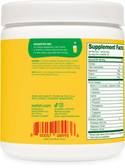 Close-up of BCAA powder and scoop for Pina Colada flavor