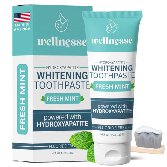 Wellnesse Whitening Hydroxyapatite Toothpaste bottle with mint label, 4 oz