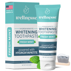 Wellnesse Whitening Hydroxyapatite Toothpaste bottle with mint label, 4 oz