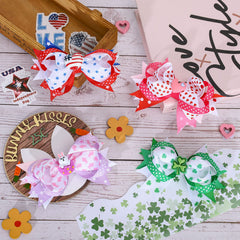 Whaline Fourth of July bow clip features stars and stripes.