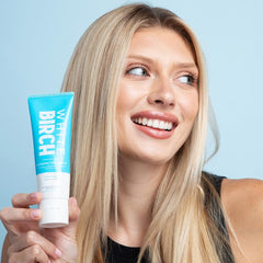 Close-up of rich foam from White Birch charcoal toothpaste