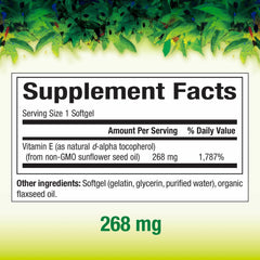 Close-up of vitamin E capsule and sunflower oil