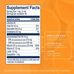 Close-up of orange flavor label on cod liver oil bottle