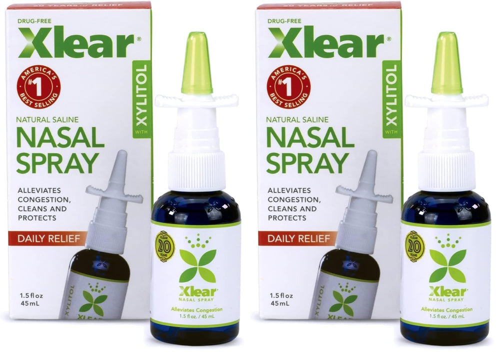 Xlear Natural Nasal Spray bottle closeup showing xylitol formula for congestion relief