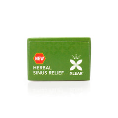 Xlear Rescue packaging on shelf emphasizes natural nasal care.