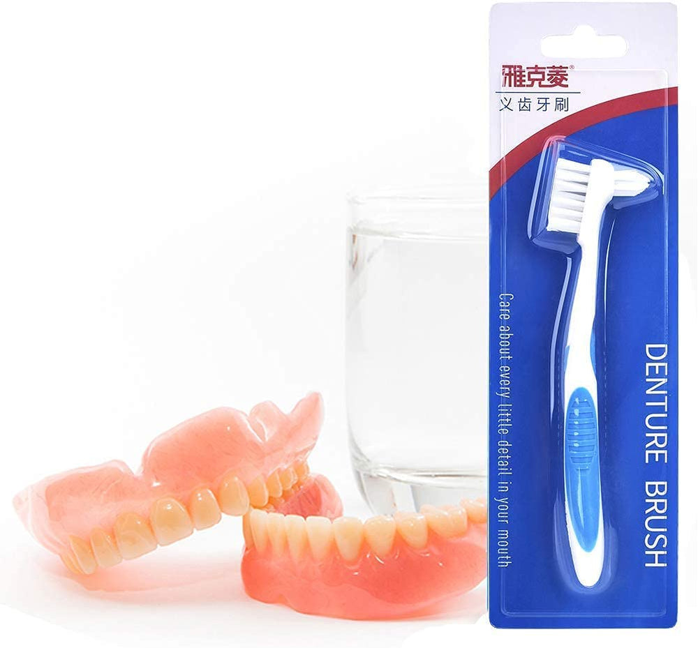 Complete denture cleaning set with storage case and brush