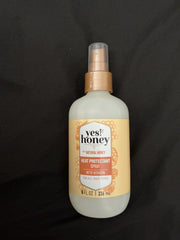 Yes! Honey Heat Protectant Hair Spray bottle provides lightweight heat protection and shine.
