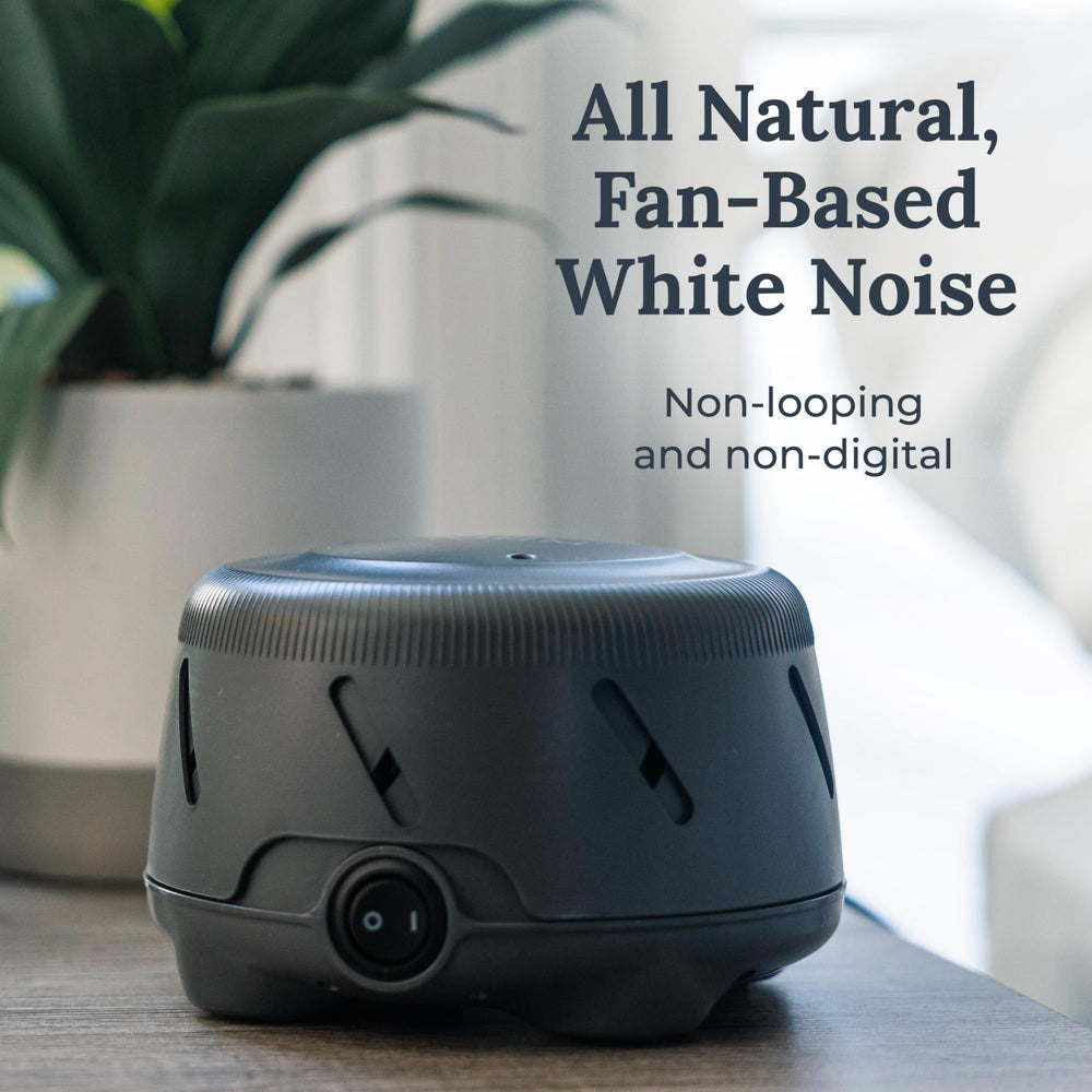 Yogasleep Dohm Uno bedroom scene demonstrates pink noise soothing sleep and focus.