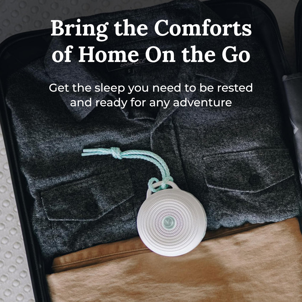 Yogasleep Rohm lanyard and USB charging setup for travel.