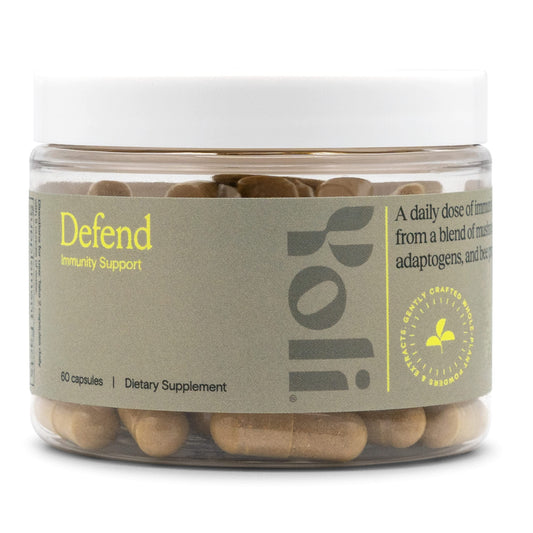 Yoli Defend bottle with label on white background