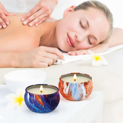 Lit travel tin candles creating cozy ambiance