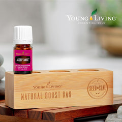 Young Living Acceptance bottle being poured for a calming ritual