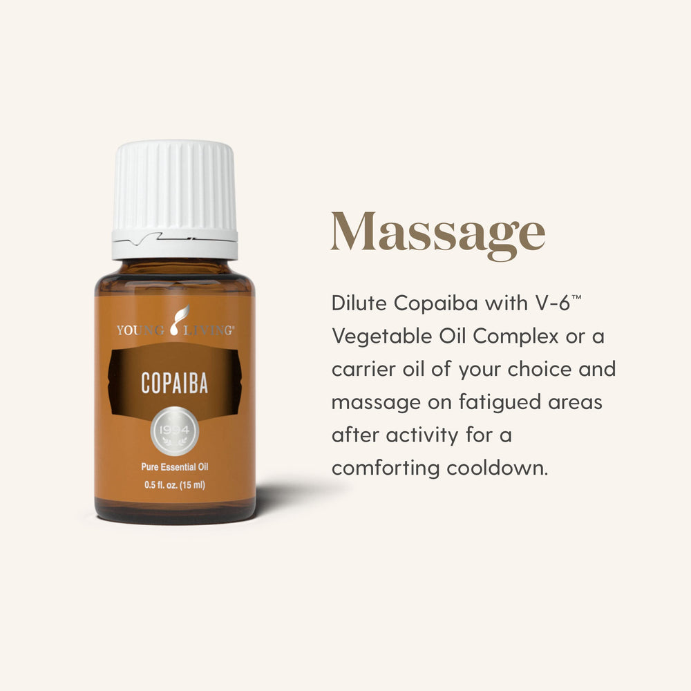 Young Living Copaiba Essential Oil applied to tense shoulders suggesting gentle muscle relief.