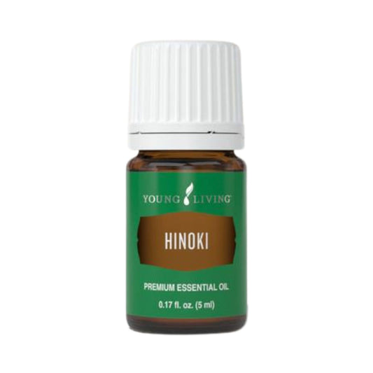 Young Living Hinoki 5ml bottle closeup for a calming, refreshing ambiance.