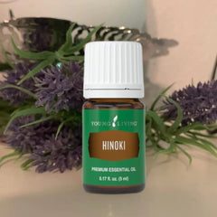 Young Living Hinoki post-workout massage oil promoting relaxation.