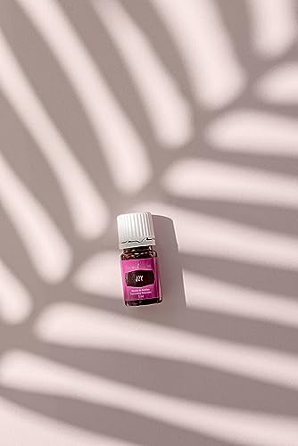 Aromatherapy diffuser releasing Joy essential oil aroma