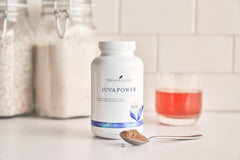 Young Living JuvaPower powder-dispense shot emphasizing convenient daily use.