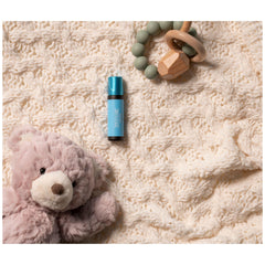 Young Living KidScents SniffleEase ingredients palette hints at eucalyptus and palo santo notes.