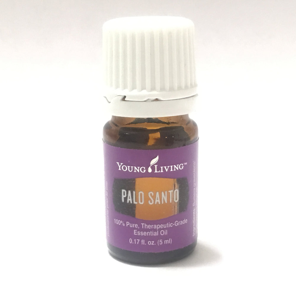 Young Living Palo Santo essential oil bottle with woodsy aroma for grounding