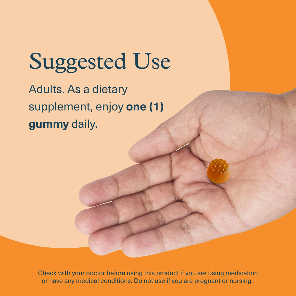 Close-up of peach-flavored K2D3 gummies
