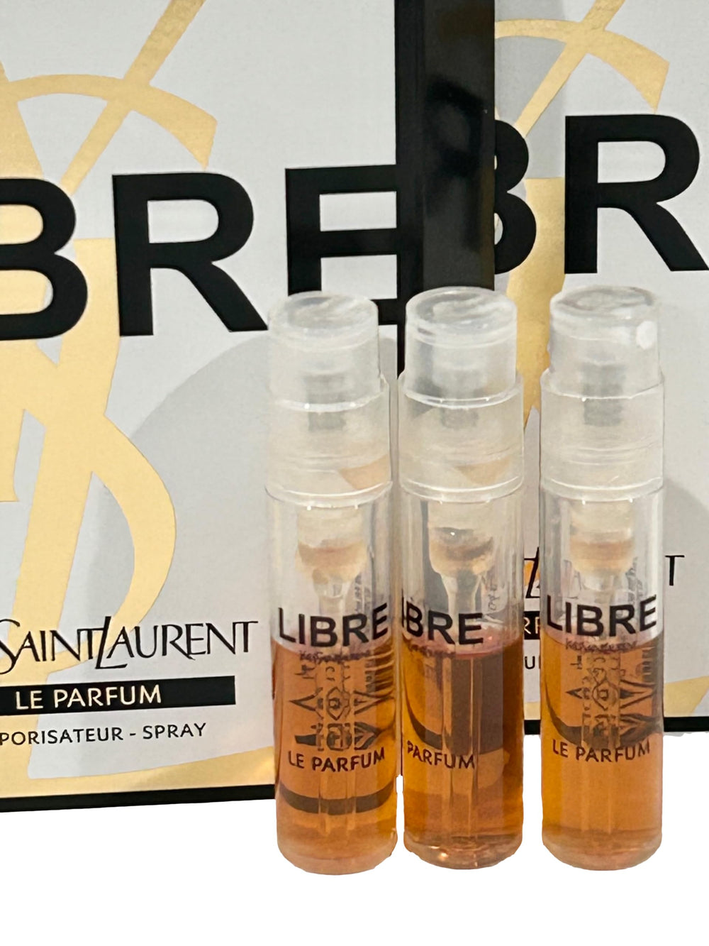 YSL Libre Le Parfum sample vial ready for on-the-go application