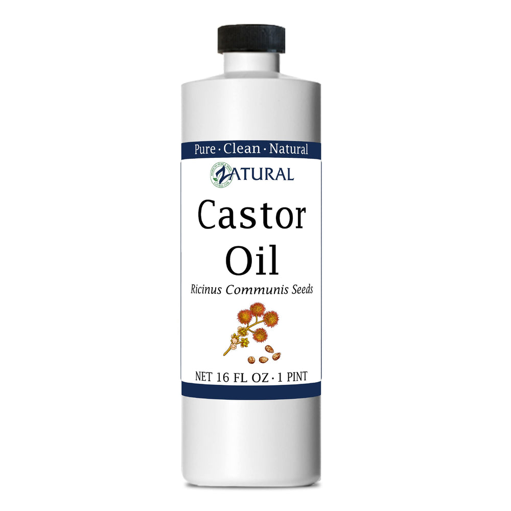 Castor oil being poured from bottle to show texture and color
