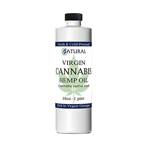 Hemp oil being poured onto a salad
