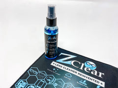 Glasses lens showing repelled dirt, oils, and dust by ZClear