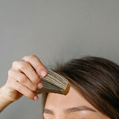 Zhuohai Contour Face Brush with protective cover for hygienic storage.