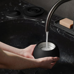 Zima Dental Pod PRO in use cleaning an oral appliance