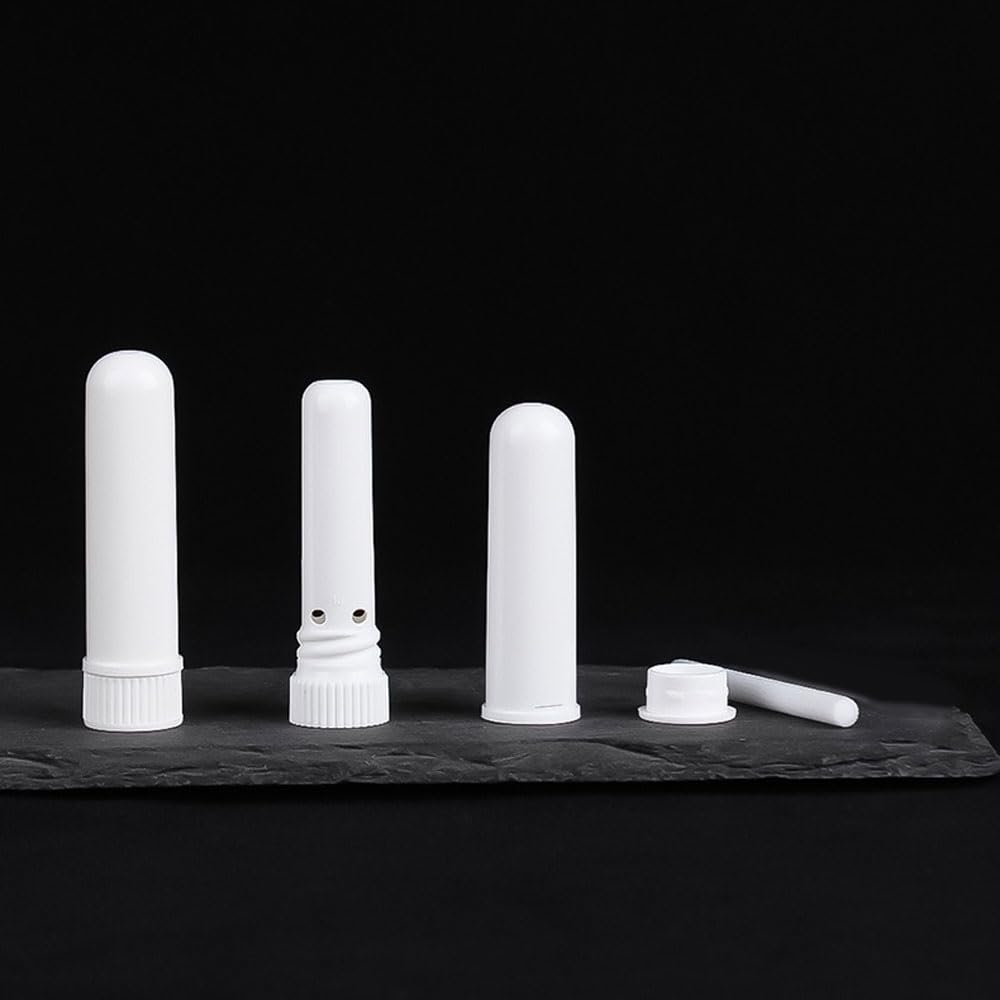 Close-up of refillable caps on white inhaler tubes