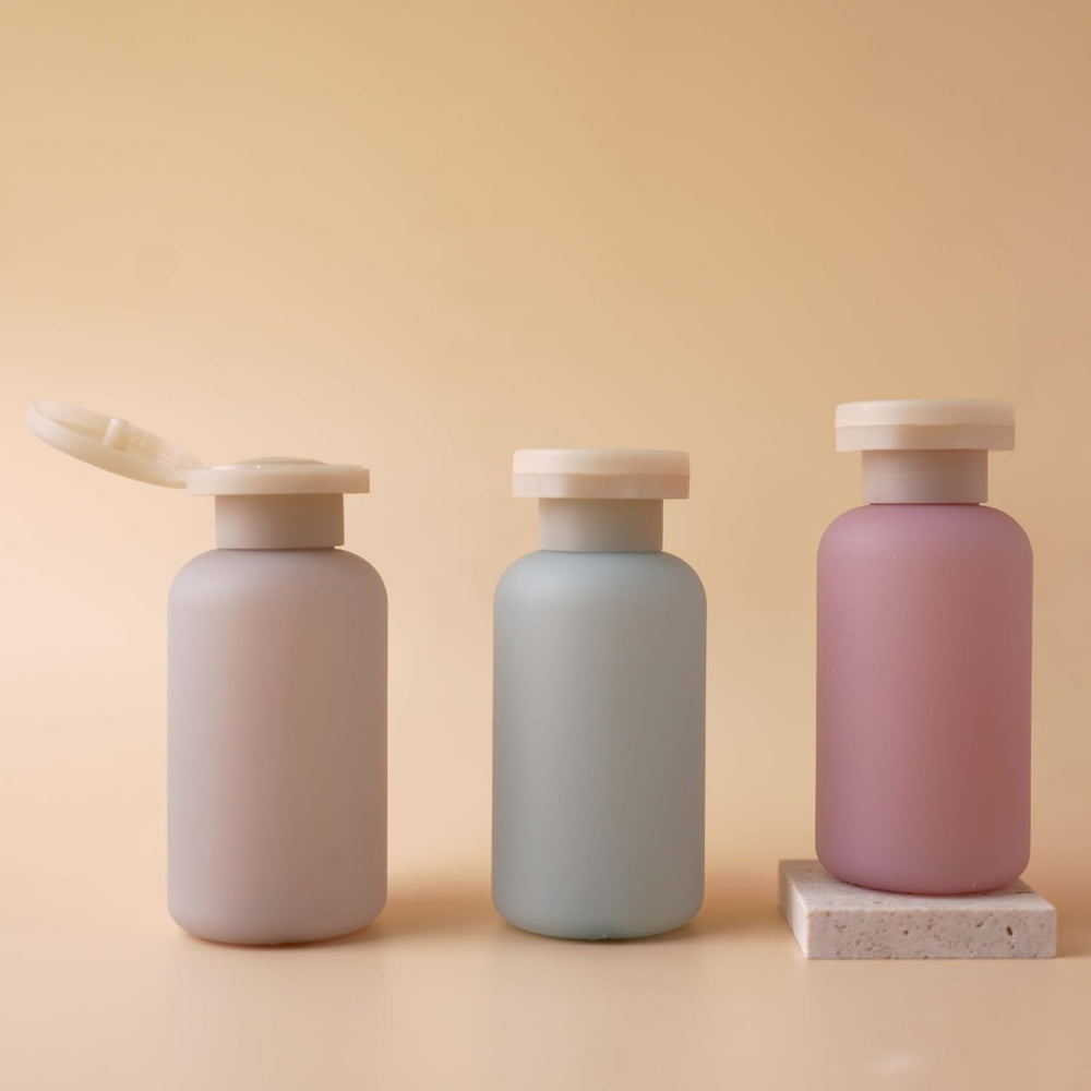 ZLSSETEC Forest Series flip-cap bottles seal securely during travel.