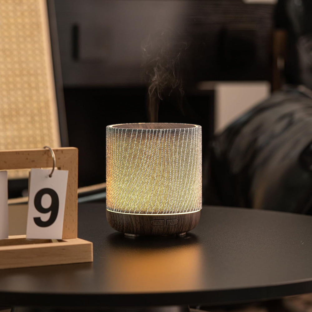 Diffuser on a bedside table highlighting room decor
