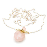 Zotoone rose quartz perfume bottle pendant on pearl bead chain for mindful wear.