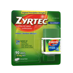 Zyrtec tablets closeup highlights active 10 mg dose for symptom relief.