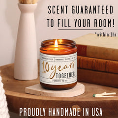 9oz candle resting on a white surface