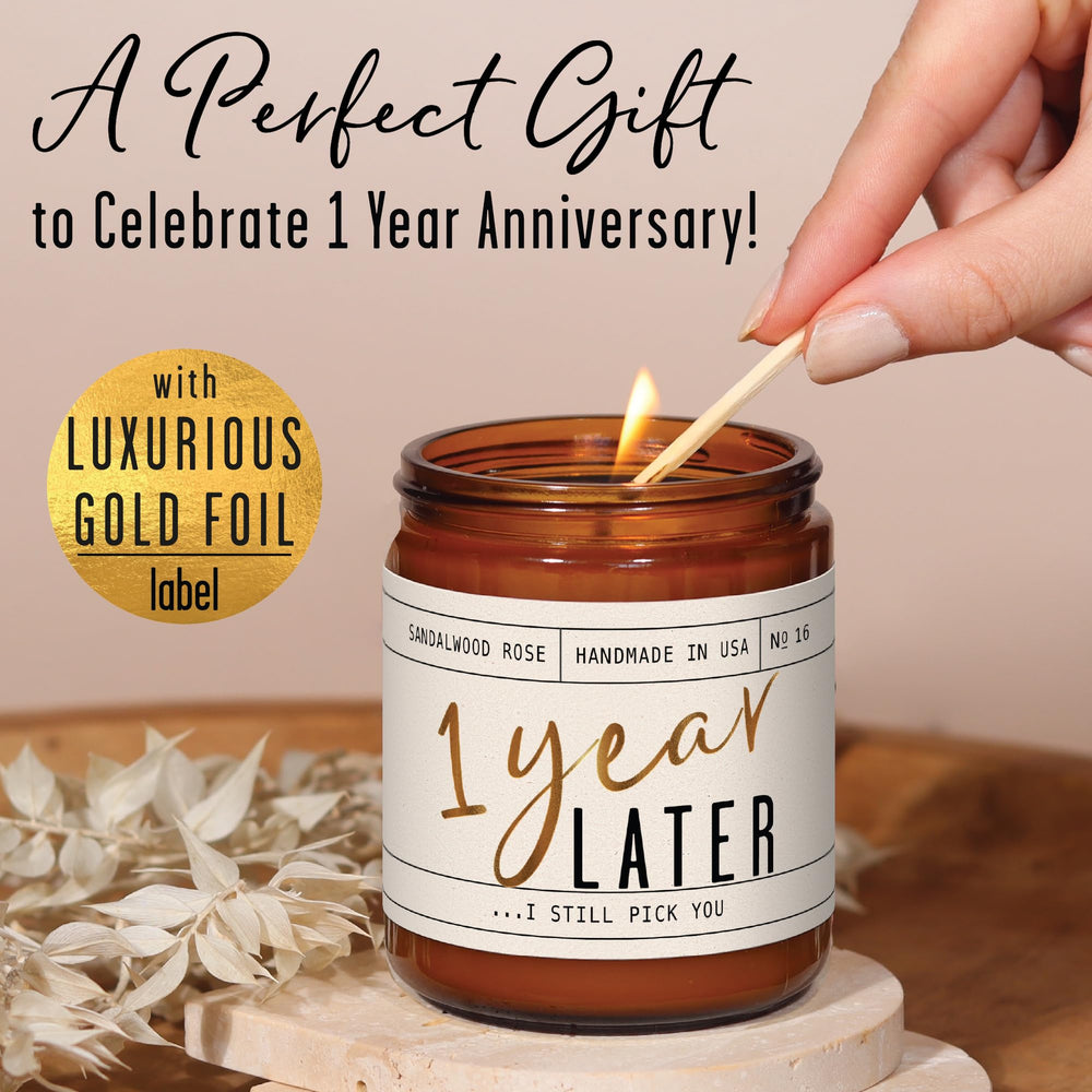 Close-up of gold foil message on anniversary candle