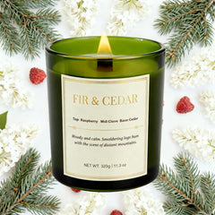 Close-up of Balsam Fir and Cedarwood candles in their gift boxes.