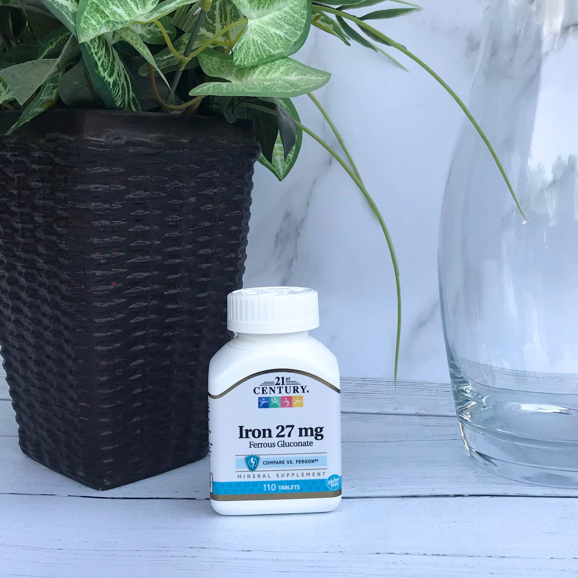 Mineral supplement bottle on white background