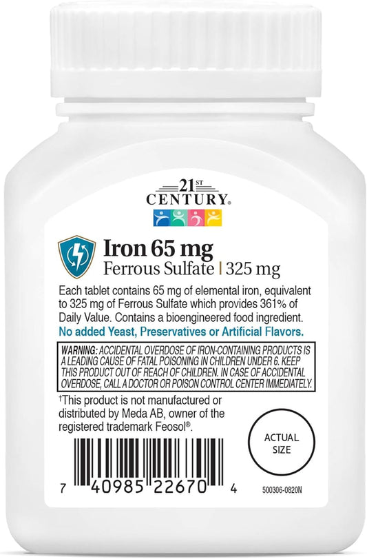 Close-up of ferrous sulfate tablet showing 65 mg elemental iron content