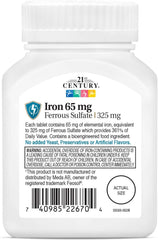 Close-up of ferrous sulfate tablet showing 65 mg elemental iron content