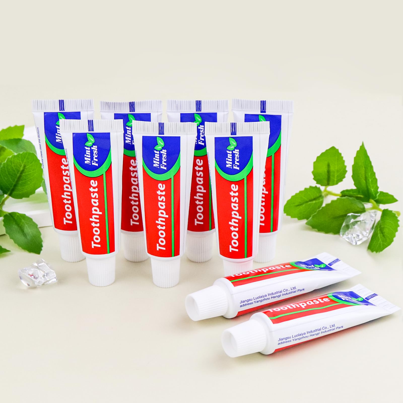 Travel-size toothpaste packaging measuring 4x1.3 inches