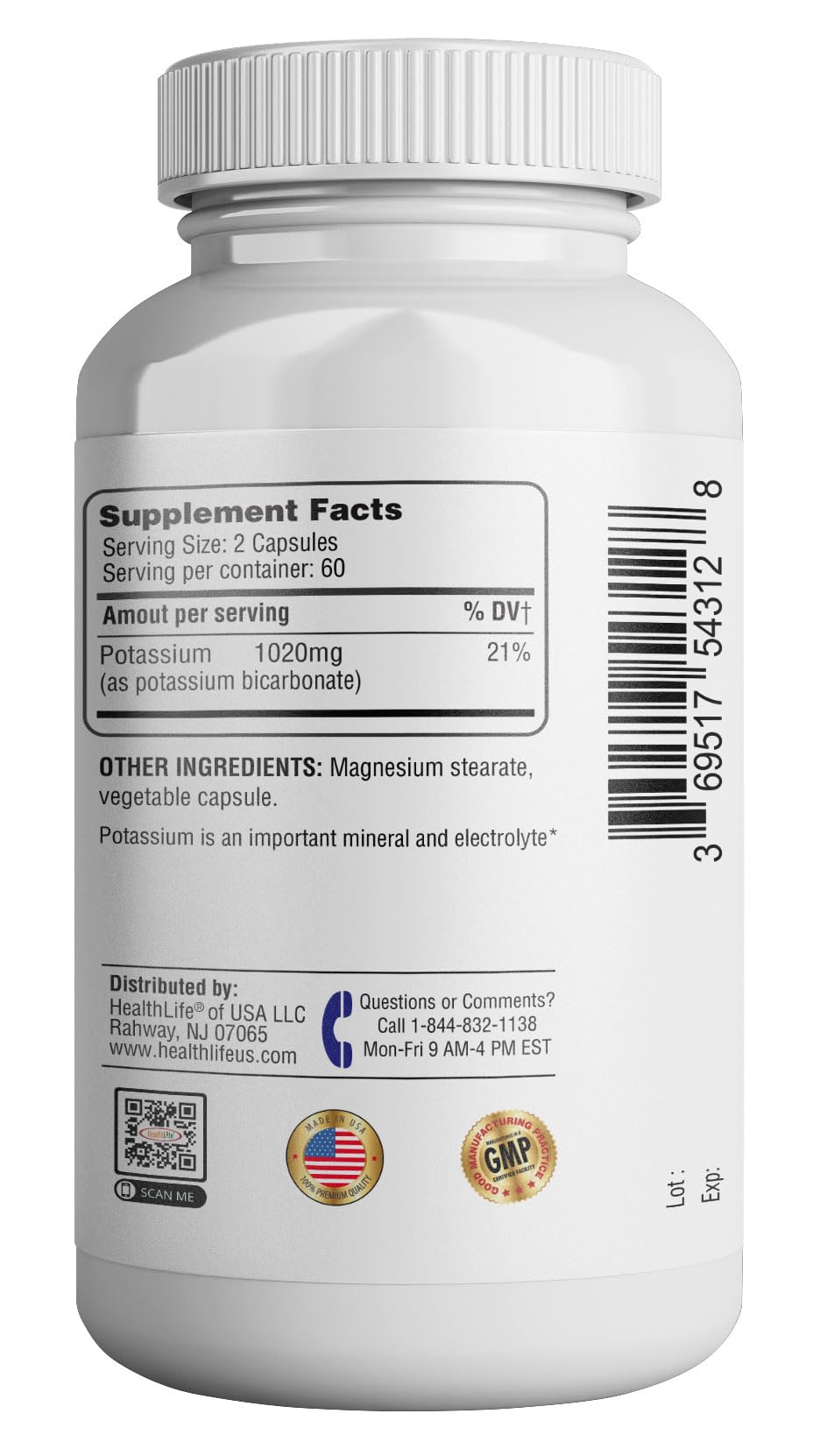 Hand holding 2-pack bottle with capsules