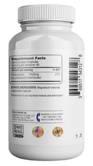 Hand holding 2-pack bottle with capsules
