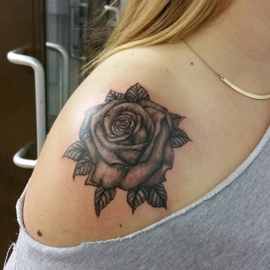 5X2Y Tattoo Tech feminine rose design with a realistic, long-lasting look.