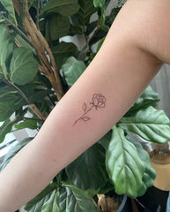 5X2Y Tattoo Tech two rose design on skin for a realistic, long-lasting look.