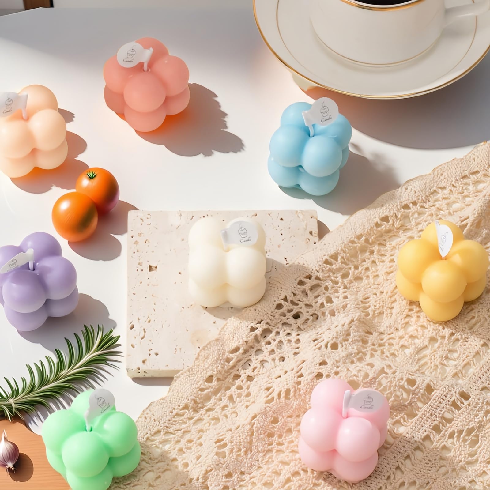 Pastel mint green bubble-shaped mini soy candle in frosted jar