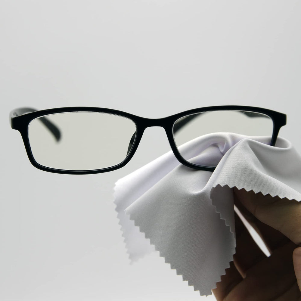 Cloths being used to wipe glasses and eyewear for delicate surfaces.
