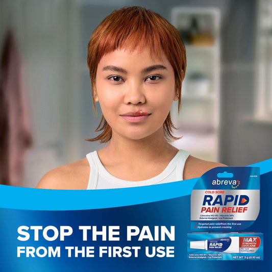 Abreva rapid pain relief cream being applied to an early cold sore.